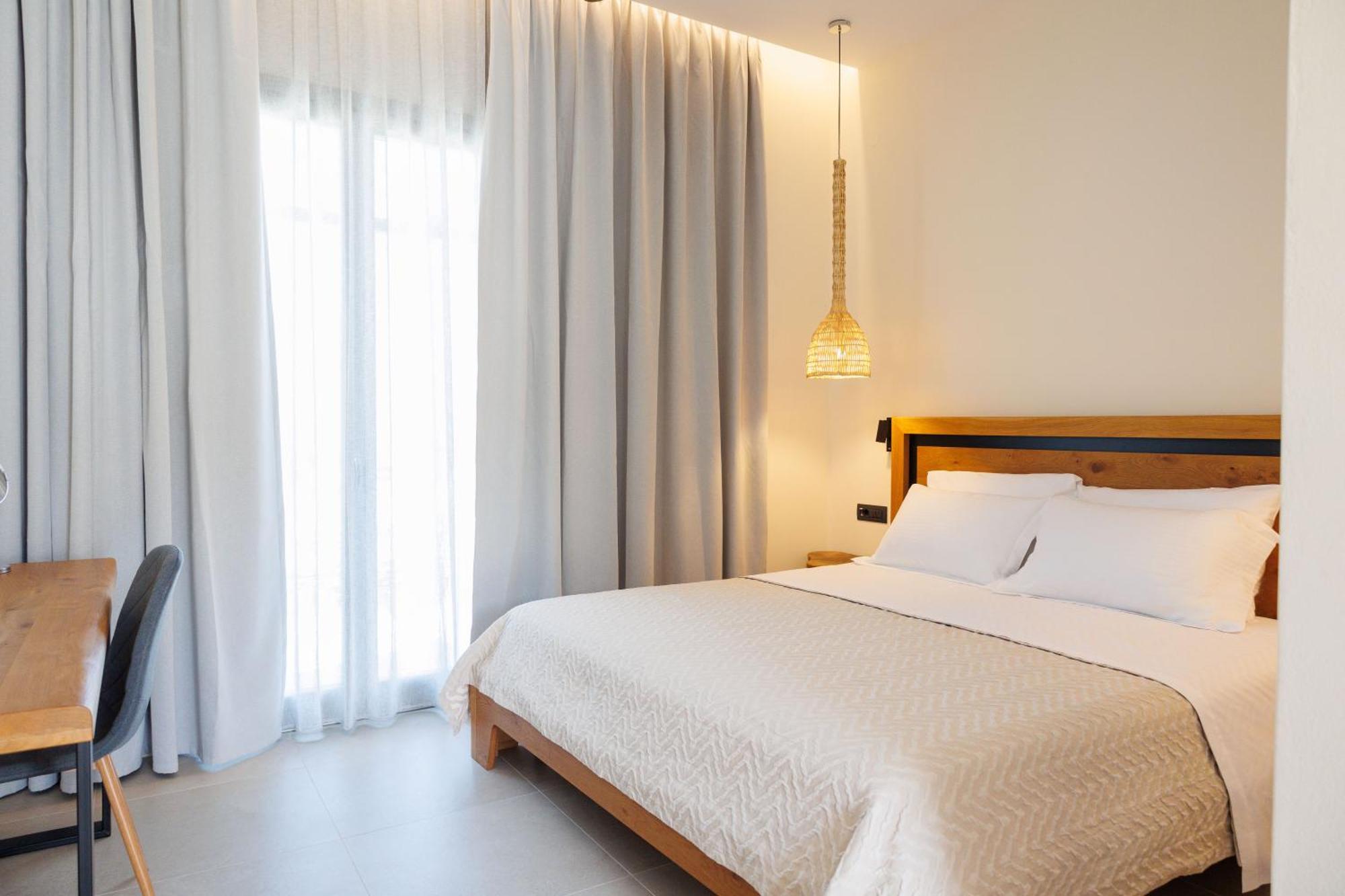 Kouros Blanc Resort & Suites Pounda Rom bilde